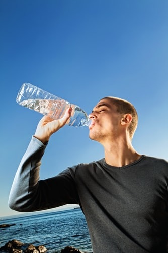 man drinking water