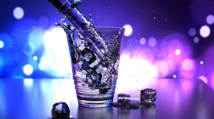 A glass of water with ice cubes