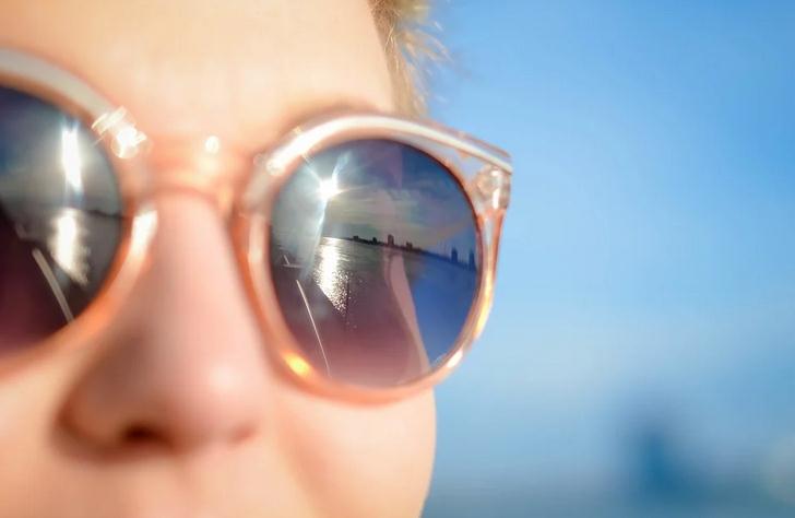 A woman wearing sunglasses
