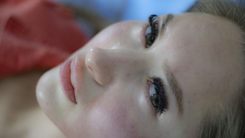 a woman getting prepped for a chemical peel