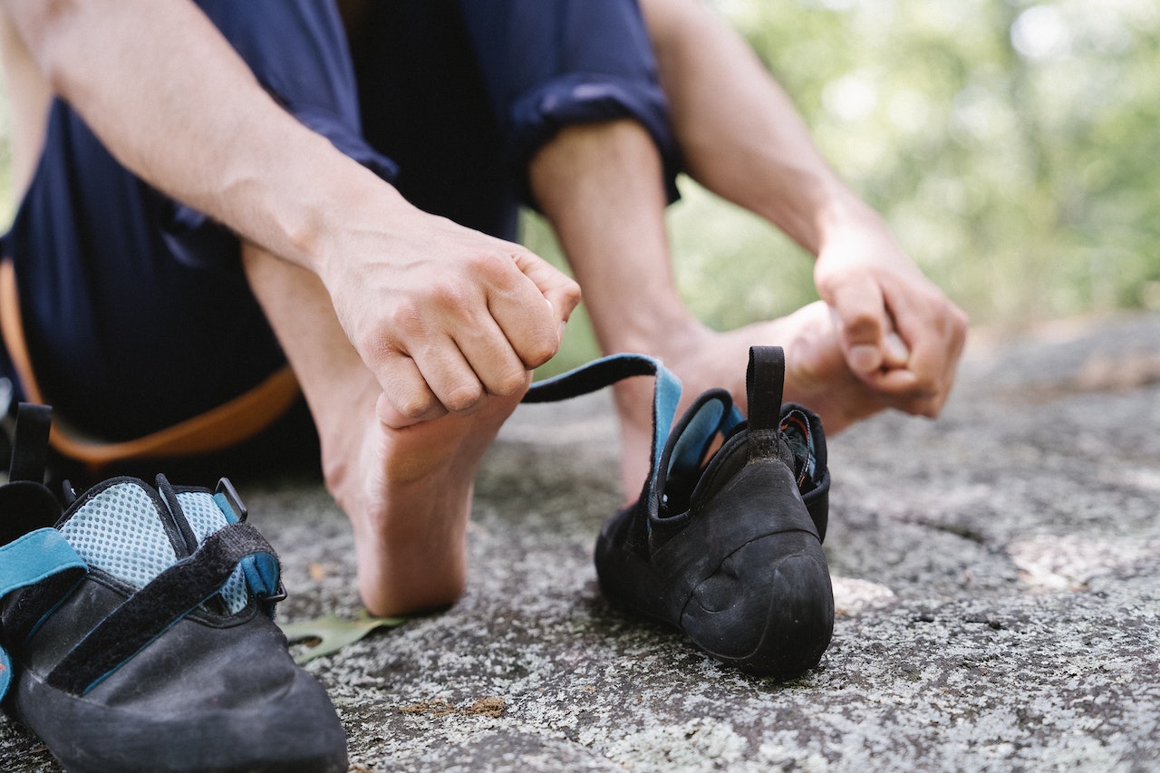 A person holding his foot