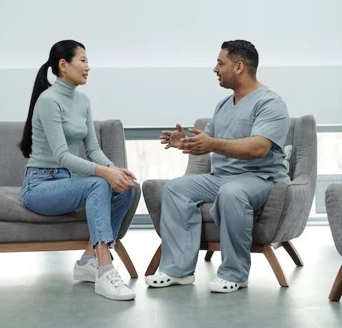 a doctor talking to a patient