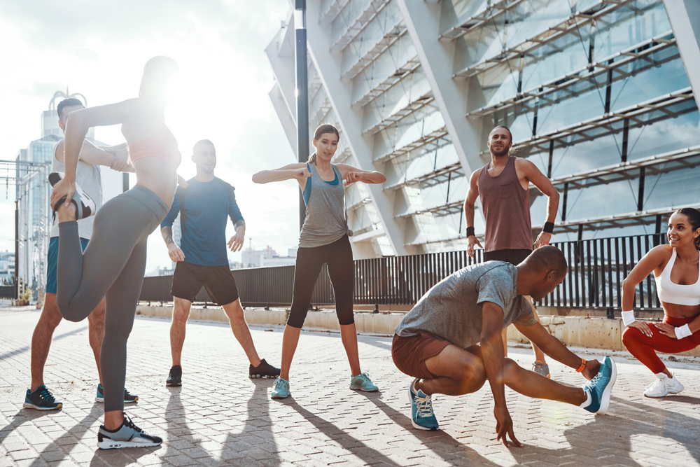 Runners stretching together before they run